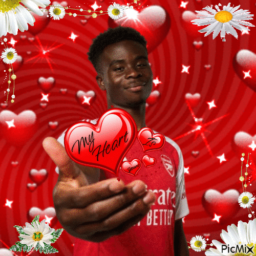 A glitter gif of Bukayo Saka with numerous daisy flower and heart decorations. His hand is extended out and the text in hearts says 'My heart is yours'.
